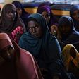 A group of Kenyan women listen during a course at the local maternity facility on what Islam allows and does not allow in terms of family planning, and on the benefits of family planning at a village in north-eastern Wajir County