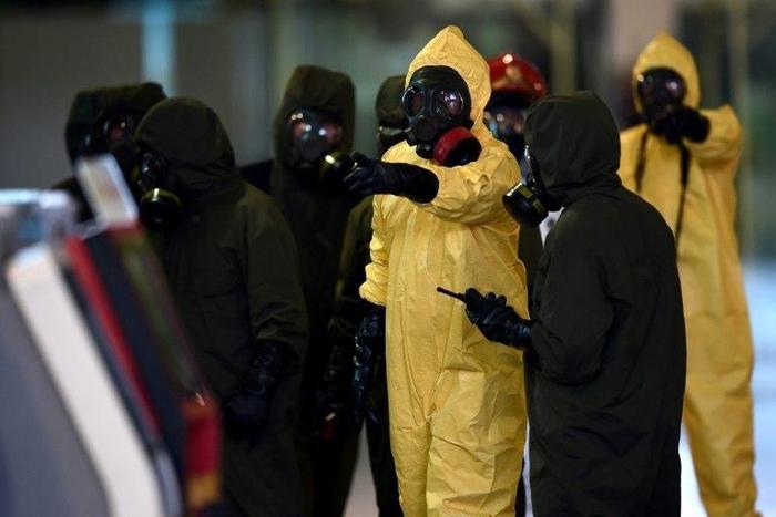 Malaysia's Hazmat team conducts a decontamination operation at the Kuala Lumpur International Airport on February 26, 2017 where Kim Jong-Nam, the half-brother of North Korean leader Kim Jong-Un, was killed
