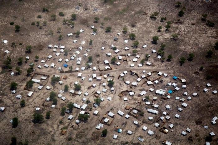 Aerial view. Up to 25,000 people were displaced during government offensives on the West Bank of the Nile river in April and May. Many walked for days on foot without access to sufficient water and arrived exhausted and weak