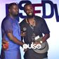 Kola Kuddus presents Hym Signage his award at NSDFW 2017