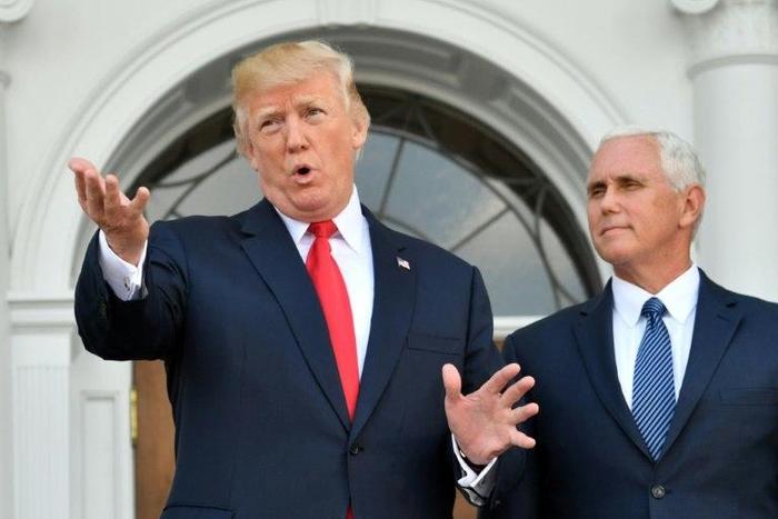 US President Donald Trump, seen here with Vice President Mike Pence, says his "fire and fury" warning to North Korea over its missile and nuclear programs was perhaps not forceful enough