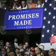 An audience member holds up a Make America Great Again sign in a crowd waiting to hear President Donald Trump speak at a campaign-style rally at the Kentucky Exposition Center in Louisville, March 20, 2017. Trump delivered a rollicking populist and nat...
