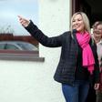 Sinn Fein's new Northern leader, Michelle O'Neill (L) meets local residents in Toome.