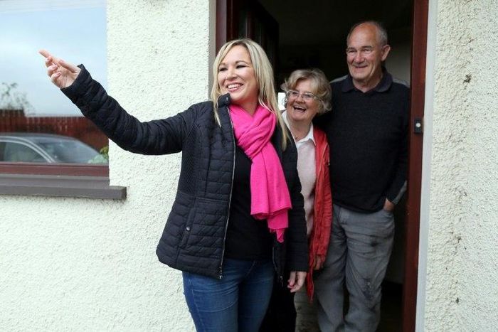Sinn Fein's new Northern leader, Michelle O'Neill (L) meets local residents in Toome.