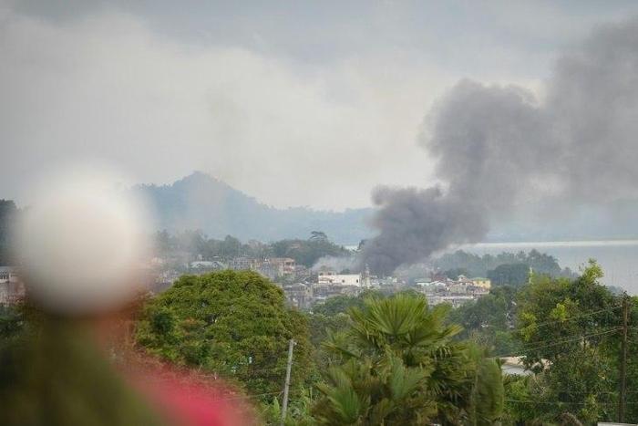 Philippine President Rodrigo Duterte imposed martial law across the whole southern region of Mindanao on Tuesday, hours after gunmen loyal to the IS group rampaged through the city