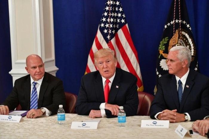 US National Security Advisor H.R. McMaster, President Donald Trump and Vice President Mike Pence (L to R) were among those attending Friday's talks at Camp David