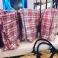 The Ghana Must Go bags on display at the Topshop