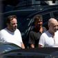 Brazilian businessman Eike Batista (2-R) is escorted as he leaves the Federal Police headquarters after a hearing in Rio de Janeiro, Brazil on February 8, 2017