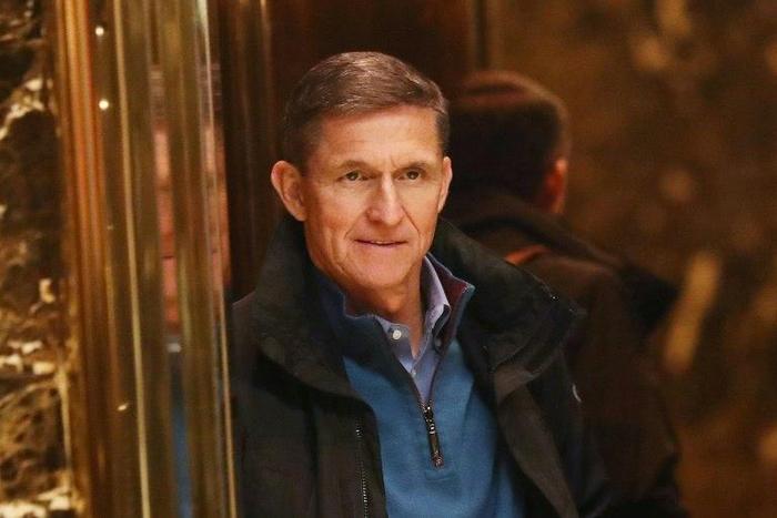 General Mike Flynn, pictured at Trump Tower in November, resigned as US national security advisor over his contacts with the Russian envoy to Washington