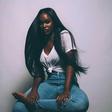 Black woman with a long hair.
