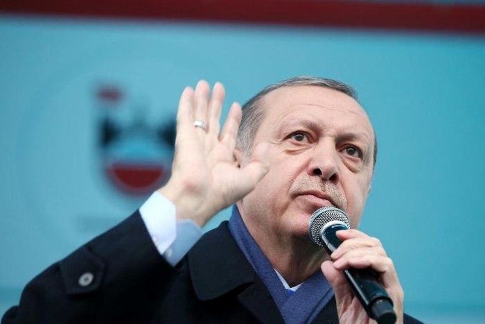 The spokesman for Turkish President Recep Tayyip Erdogan (pictured) said the US strike against the Sharyat airbase in Homs was "a positive response"