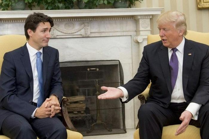 US President Donald Trump and Canadian Prime Minister Justin Trudeau meet in the Oval Office of the White House in Washington, DC, on February 13, 2017