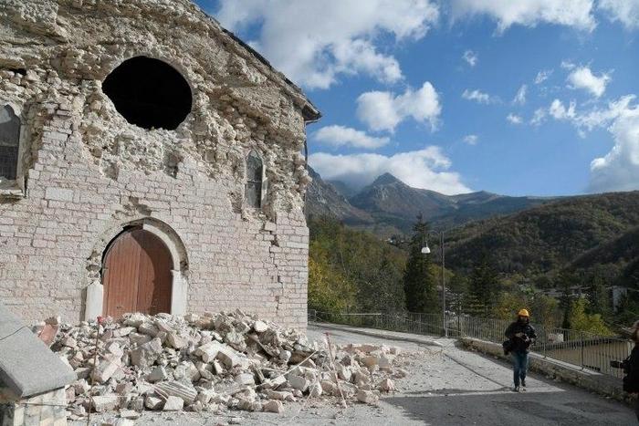 A damaged church in Ussita, central Italy, a day after powerful twin earthquakes rocked the region, on October 27, 2016