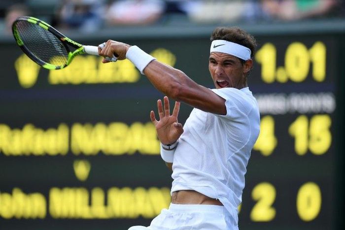 Spain's Rafael Nadal returns against Australia's John Millman during their men's singles first round match on the first day of the 2017 Wimbledon Championships in London July 3, 2017