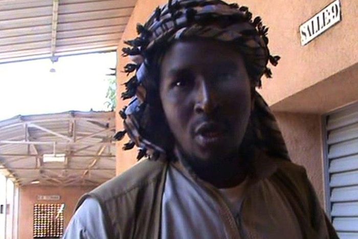 A file grab taken from a video shows Aliou Mahamar Toure, a member of Al-Qaeda offshoot MUJAO, who is on trial for alleged atrocities committed when he was the head of an Islamic police brigade deployed by jihadists in the northern Mali city of Gao.