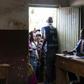 Classroom queue: Voters wait outside a polling station at the Institute Maendeleo in Kabare, South Kivu province