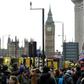 Members of the emergency services work on Westminster Bridge, alongside the Houses of Parliament in central London on March 22, 2017