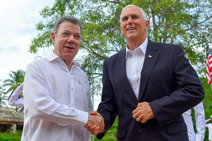 US Vice President Mike Pence, seen in this handout meeting with Colombia's President Juan Manuel Santos in Cartagena, is on a Latin American tour dominated by concerns over Venezuela