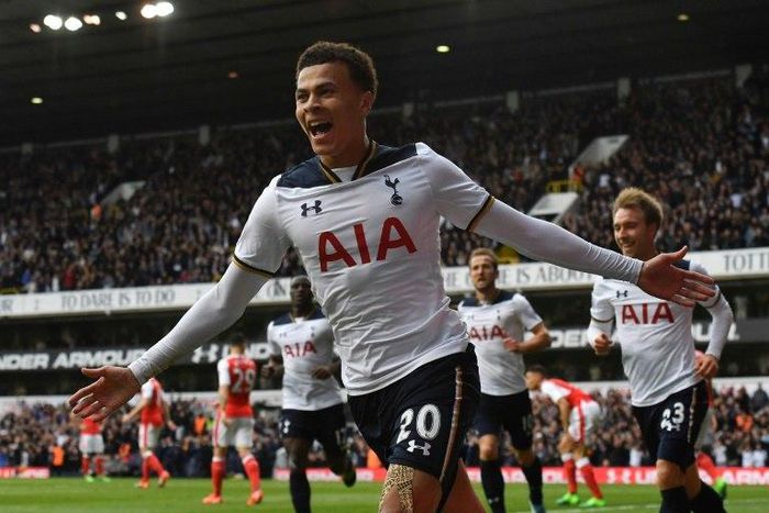 Tottenham Hotspur's midfielder Dele Alli celebrates scoring the opening goal during the English Premier League football match against Arsenal April 30, 2017