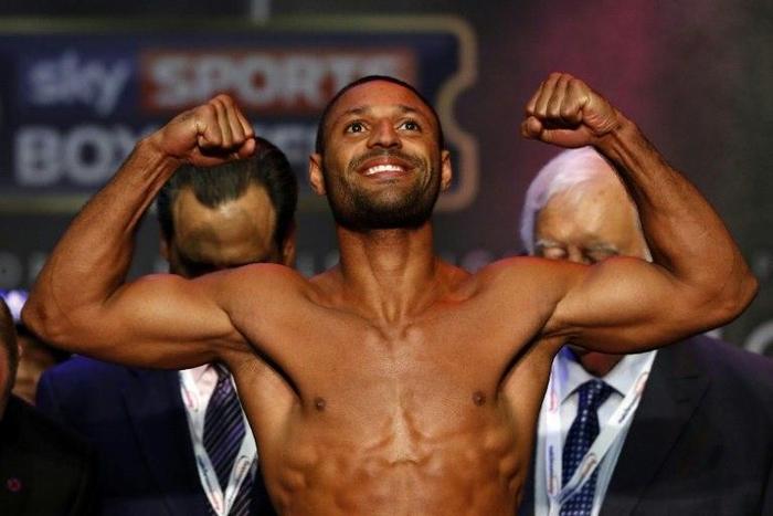 Britain's Kell Brook poses during the weigh-in for his middleweight fight against Gennady Golovkin of Kazakhstan in London, on September 9, 2016