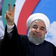 Iranian President Hassan Rouhani gestures to the camera after registering to run for re-election in Tehran on April 14, 2017
