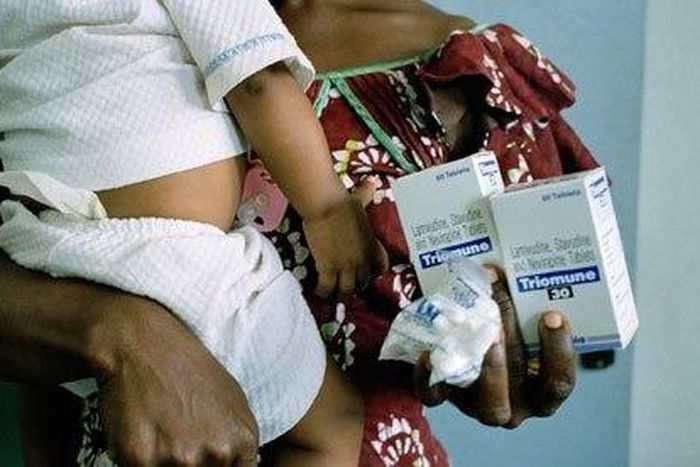 An HIV-positive woman collects her anti-retroviral drugs in Lagos, Nigeria.