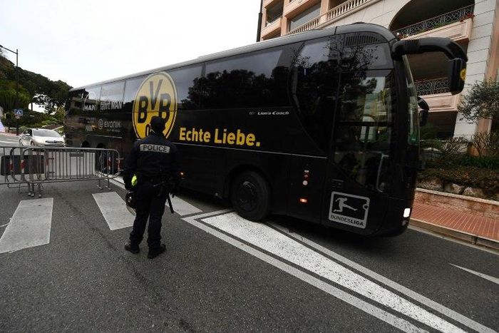 The Dortmund bus arrives under police escort at the Louis II stadium prior to their UEFA Champions League football match against Monaco, on April 19, 2017