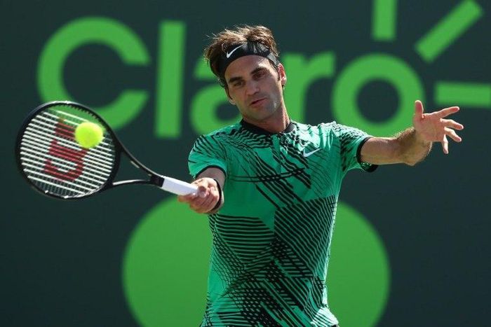 Roger Federer of Switzerland returns a shot against Juan Martin Del Potro of Argentina during Day 8 of the Miami Open at Crandon Park Tennis Center on March 27, 2017 in Key Biscayne, Florida