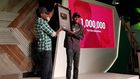 Comedian Mark Angel receiving the gold-plated YouTube plaque at Google For Nigeria for hitting 1 million YouTube subscribers, the first Nigerian-owned channel to do so.