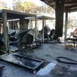 Containers used as an office by asylum officials destroyed by a fire in the Moria hotspot on the island of Lesbos, Greece on October 24, 2016