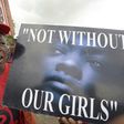 A member of "Bring Back Our Girls" movement carries placard to press for the release of the missing Chibok schoolgirls in Lagos, on April 14, 2016