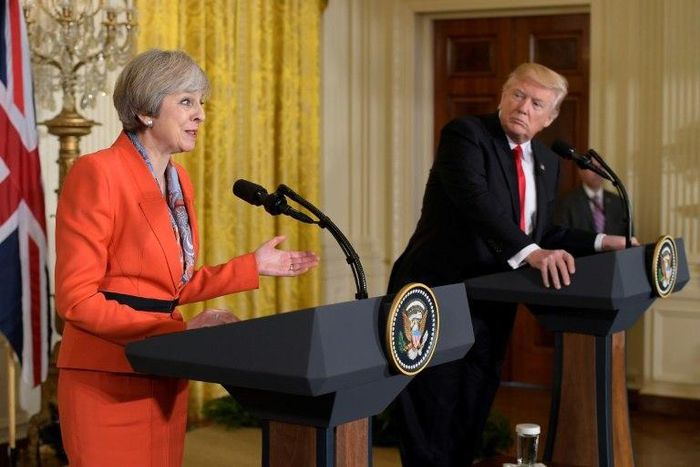 Donald Trump's immigration ban is divisive and wrong, according to Britain's Prime Minister Theresa May