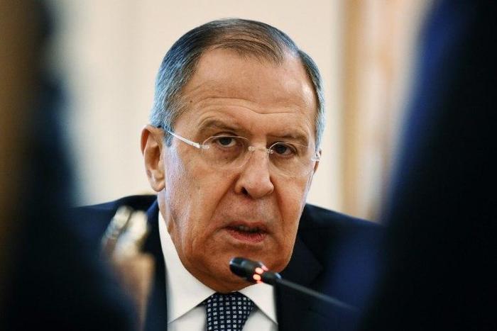 Russian Foreign Minister Sergei Lavrov speaks with his Senegalese counterpart during a meeting in Moscow on April 17, 2017