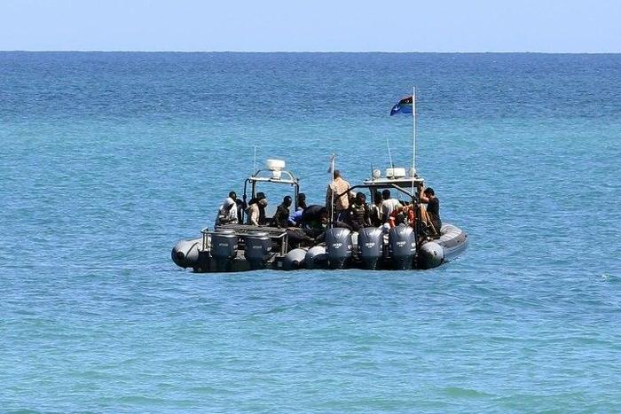 Migrants from Africa are seen after being rescued by Libyan coast guards rescued at sea, off the coastal town of Tajoura, 15 kilometres east of the capital Tripoli on May 23, 2017