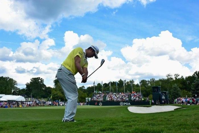 Hideki Matsuyama of Japan plays his shot on the ninth hole during the third round of the 2017 PGA Championship at Quail Hollow Club in Charlotte, North Carolina, on August 12, 2017