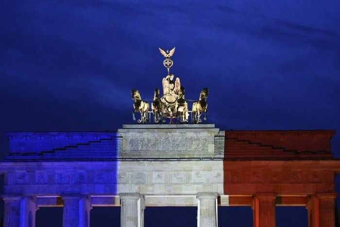 Germany's Brandenburg Gate lit up in the French national colours after Islamic extremists went on the rampage in Paris, killing 130 people