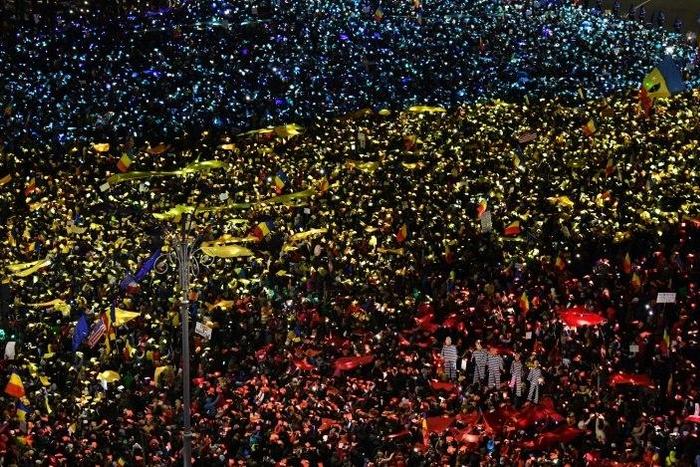 People protest in front of the government headquarters in Bucharest, against the controversial corruption decrees on February 12, 2017