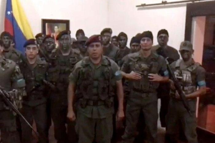 This video screen grab, posted on August 6, 2017, shows a man who claims to be army captain Juan Caguaripano launching his "legitimate rebellion" against Maduro's "tyranny," before his group supposedly raided a Venezuelan army base
