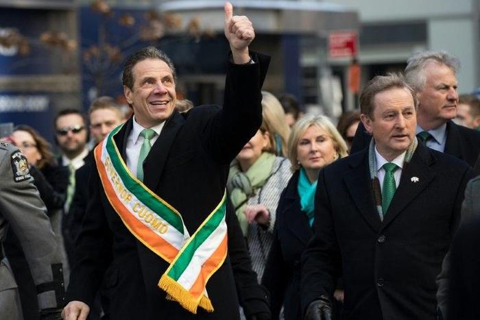 New York Governor Andrew Cuomo (L) said a state immigrant legal defense initiative would ensure the state lived up to the values embodied by "the Lady in our Harbor"