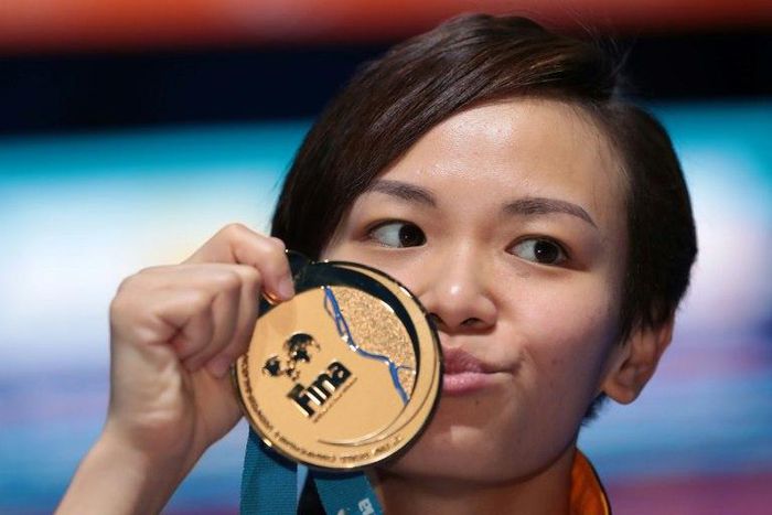 Malaysia's Cheong Jun Hoong poses with her gold medal during the podium ceremony for the women's 10m platform final during the diving competition at the 2017 FINA World Championships in Budapest, on July 19, 2017