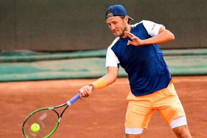 France's Lucas Pouille returns the ball to Britain's Aljaz Bedene during their final match at the Hungarian Open in Budapest, on April 30, 2017