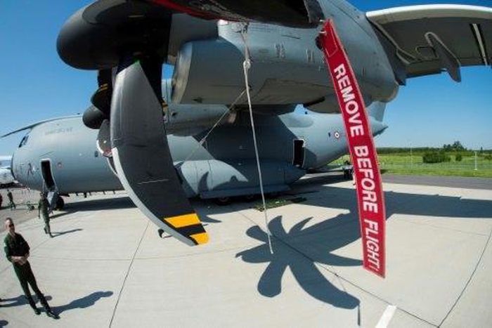 Airbus says charges stemming from problems with its A400M military cargo transport plane hit net profits hard in 2016