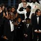 US director Barry Jenkins (C) speaks after "Moonlight" won the Best Film award at the 89th Oscars on February 26, 2017 in Hollywood, California