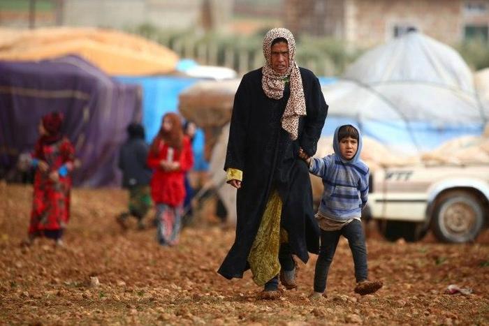 Displaced Syrians, who fled their hometowns due to clashes between regime forces and the Islamic State (IS) group, pictured in Kharufiyah, 18 kilometres south of Manbij, northern Syria on March 4, 2017