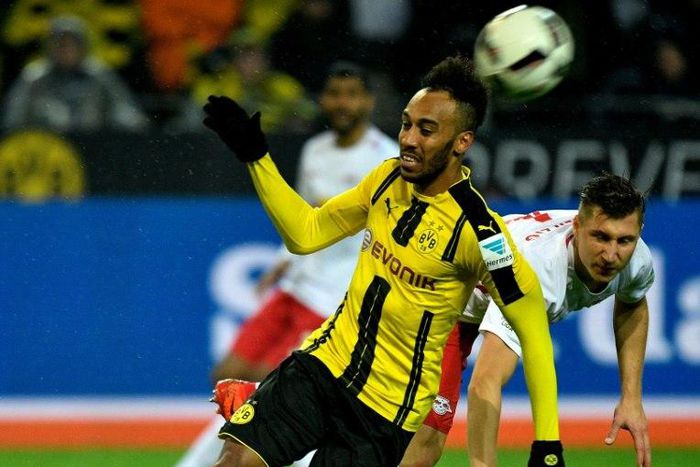 Dortmund's forward Pierre-Emerick Aubameyang (L) and Leipzig's defender Willi Orban (R) vie for the ball during the German First division Bundesliga football match between Borussia Dortmund and RB Leipzig, on February 4, 2017