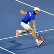 Pierre-Hugues Herbert of France returns a shot against Yasutaka Uchiyama of Japan during their Davis Cup World Group match, in Tokyo, on February 5, 2017