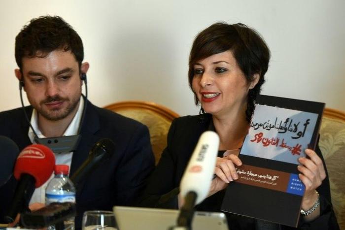 Human Rights Watch's director in Tunisia, Amna Guellali (R), speaks during a press conference on February 2, 2016 in Tunis to present a 33-page document about the country's draconian drug law