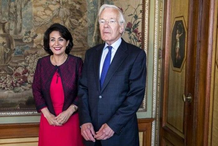 Retired Dutch politician Herman Tjeenk Willink (R) meets Chairman of the senate Khadija Arib in The Hague, on May 30, 2017, after he was appointed as the moderator for a new round of negotiations to form a coalition government