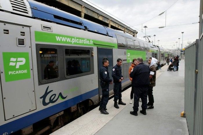 French policemen patrol on a platform at the Gare du Nord train station in Paris on April 22, 2017, after a man carrying a knife was arrested