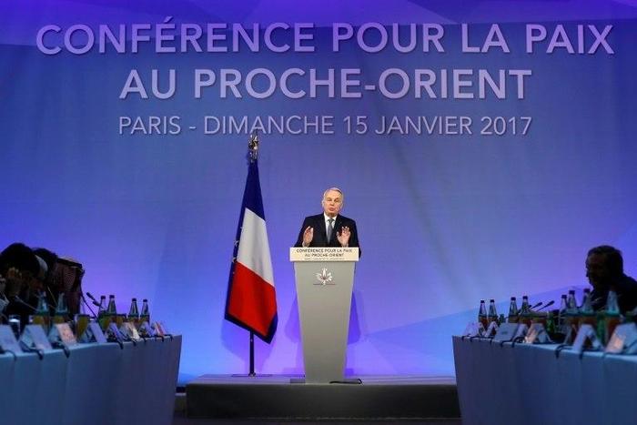 French Minister of Foreign Affairs Jean-Marc Ayrault addresses delegates at the opening of the Middle East peace conference in Paris on January 15, 2017